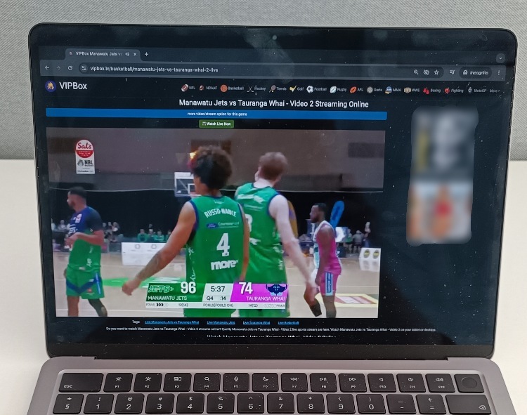 Live basketball coverage playing on VIPBox via a laptop