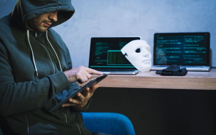 The image of an advance cyber security specialist using tablet