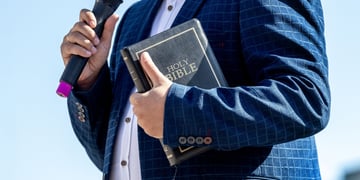 pastor-holding-bible