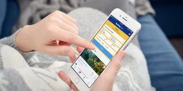 Person using Booking app